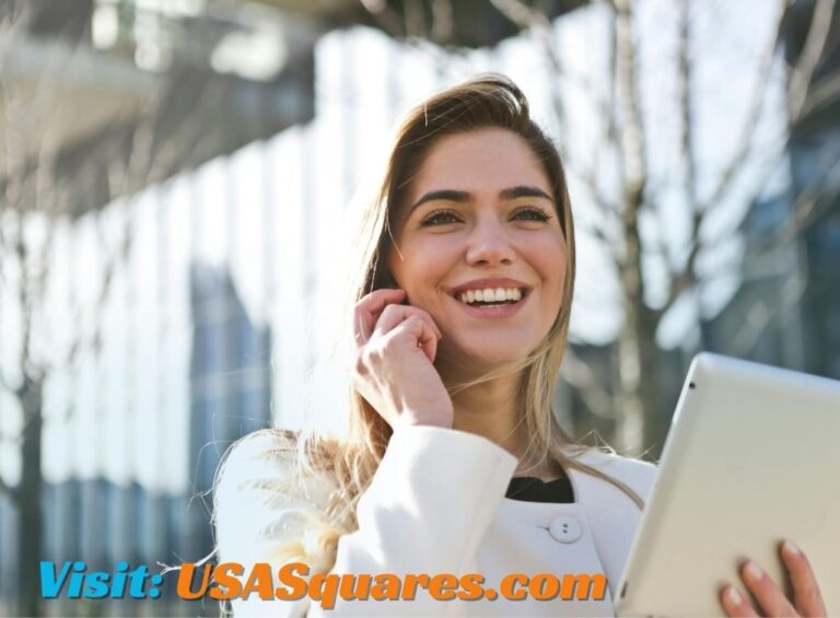 Smiling woman accessing procurementnation.com contact on her tablet outdoors