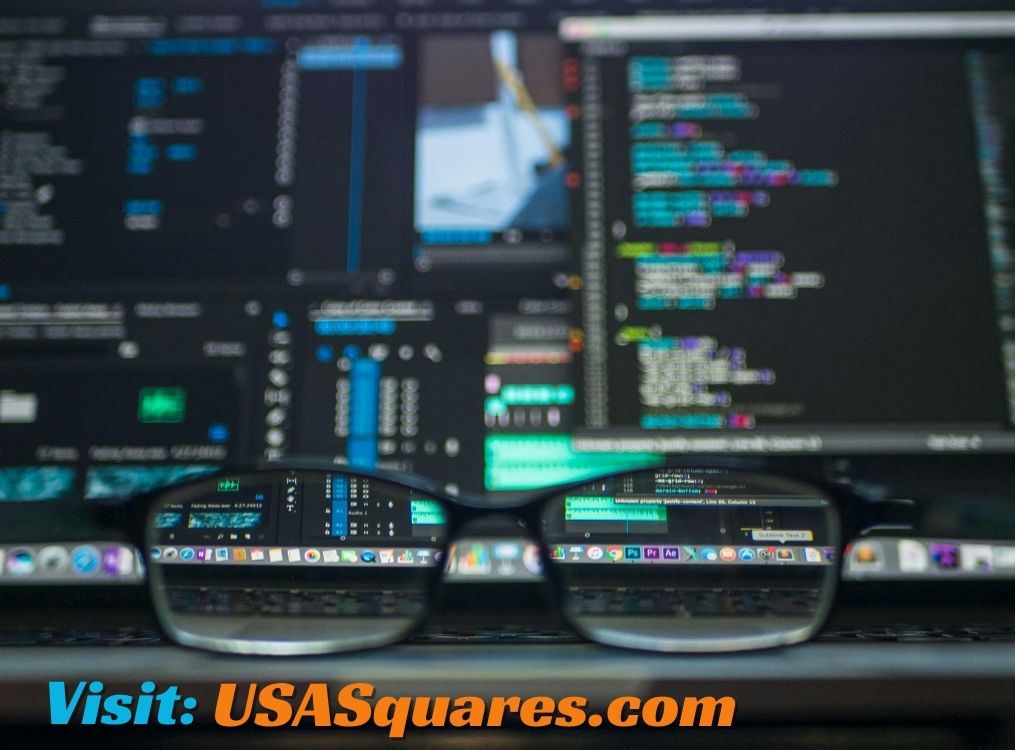 Glasses focusing on a coding screen with text 'Visit: USASquares.com' and related to Chris Blakey the Developer Link Jordan Cutler