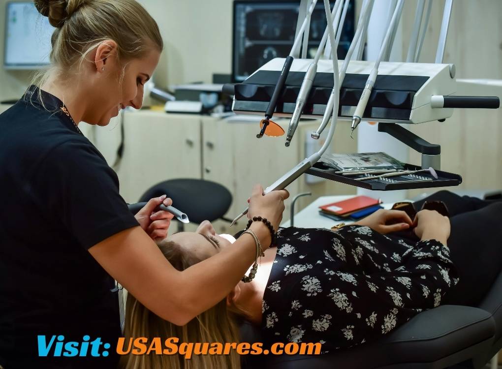 Dentist performing a dental procedure with precision at Female Comfort Dental Centers.