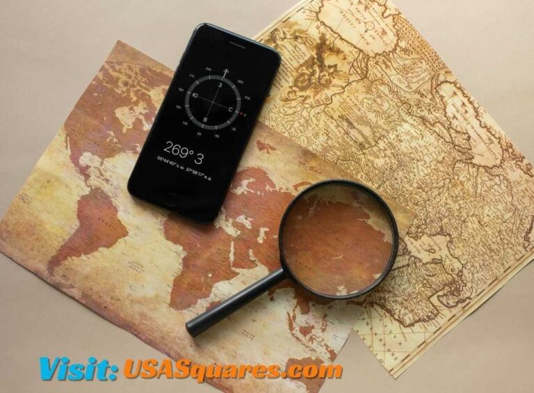 Antique world map with a smartphone showing a compass and magnifying glass, symbolizing historical exploration. Visit onthisveryspots.com/