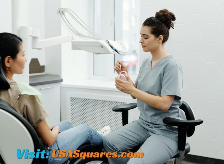 Dentist demonstrating dental hygiene tips to a patient at Female Comfort Dental Centers.